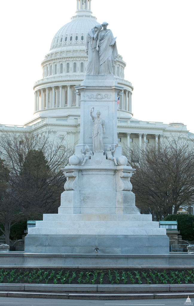 photo of the US Capitol and Peace Monument statue
